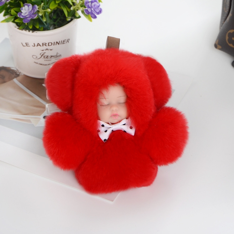 Chlpatá kľúčenka - Spiace bábätko v kožušine červenej